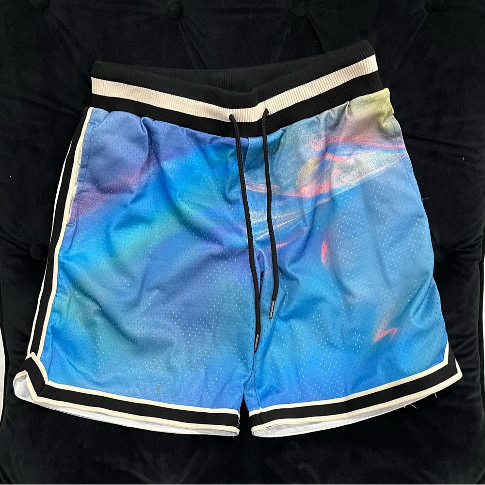 Multi color blue MNML brand short. net material. size M